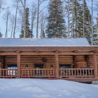 mountain village vacation rental yellow brick cabin