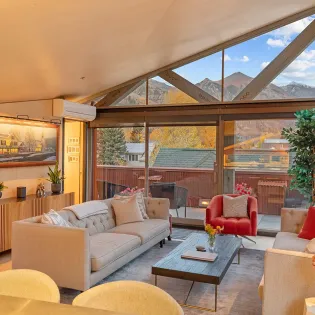 2.0 spritz house telluride penthouse living area from kitchen twilight