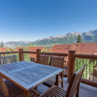 2.4 125 tristant mountain village living room deck view