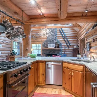 mountain village vacation rental yellow brick cabin kitchen