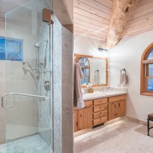 mountain village vacation rental yellow brick cabin master bathroom